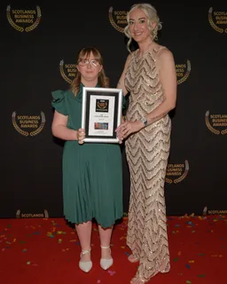 Rise and Dine collecting their award at the Scotland&rsquo;s Business Awards